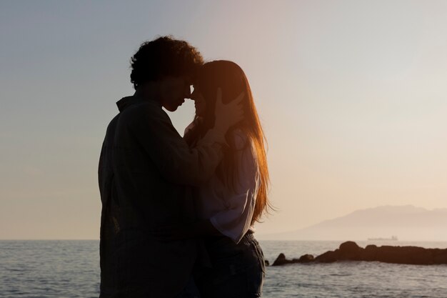 Bridegroom silhouette by the seaside