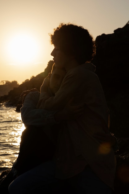 Bridegroom silhouette by the seaside