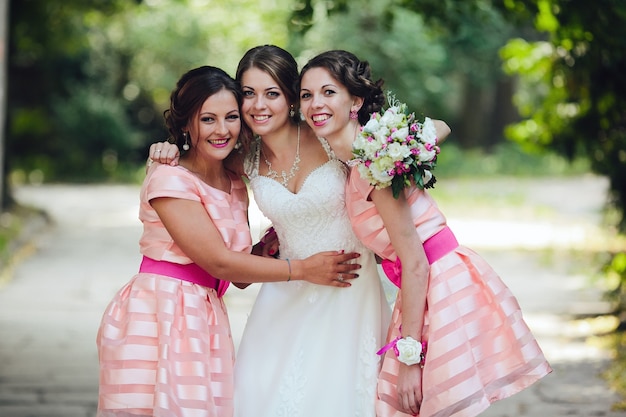 Bridesmaids posing with bride