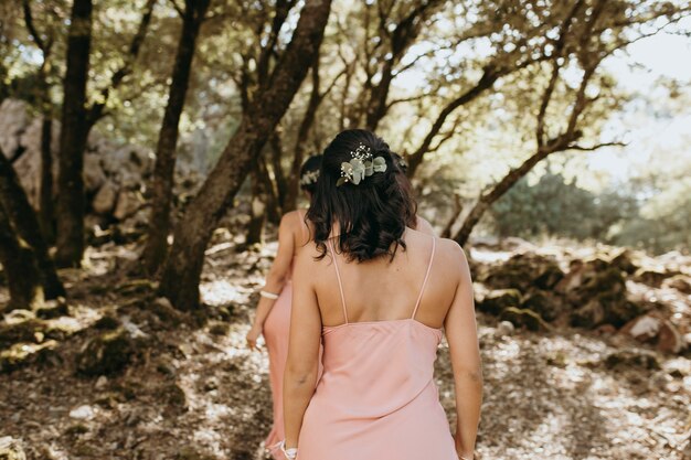 Bridesmaids in pretty dresses celebrating