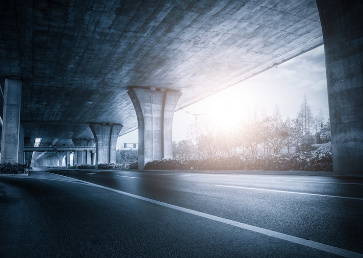 Free Photo under a bridge at sunset