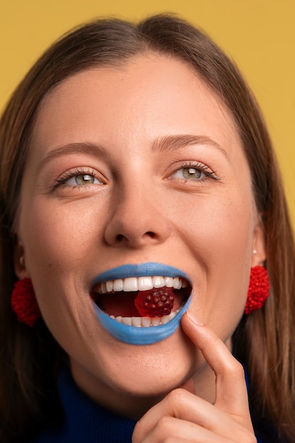 Bright blue lips portrait with copy space