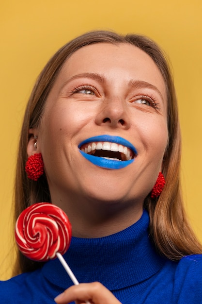 Bright blue lips portrait with copy space