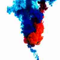 Free photo bright blue and red ink mixing