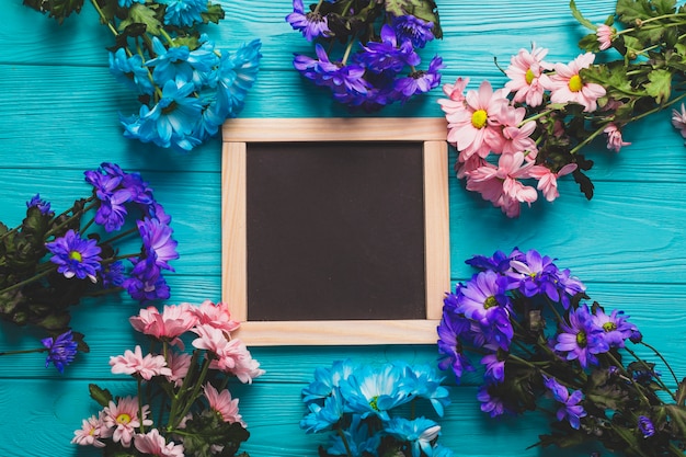 Bright bouquets around chalkboard