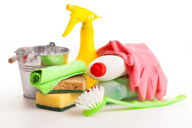 Bright colorful cleaning set on a wooden table