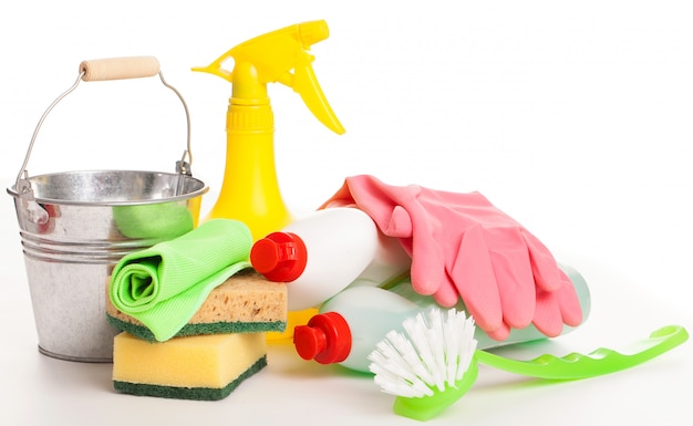 Bright colorful cleaning set on a wooden table