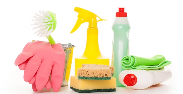 Bright colorful cleaning set on a wooden table