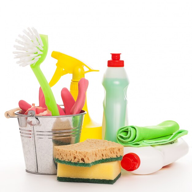 Bright colorful cleaning set on a wooden table