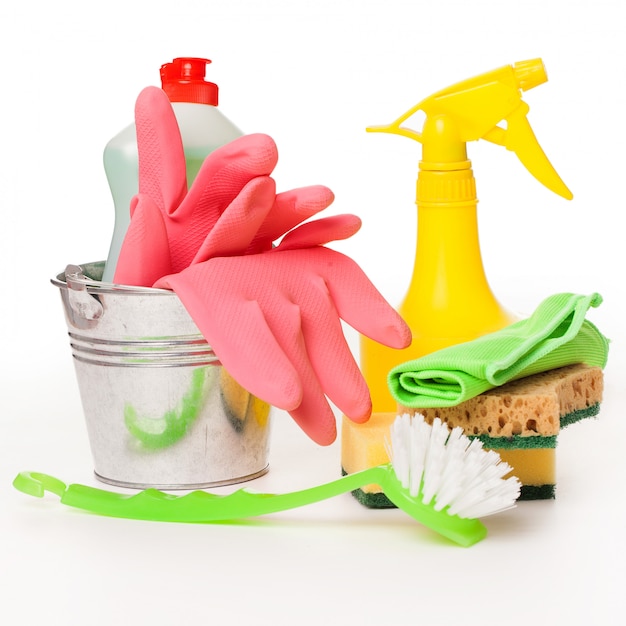 Free photo bright colorful cleaning set on a wooden table