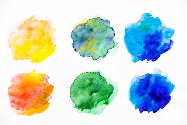 Bright colorful watercolor splatter on white background