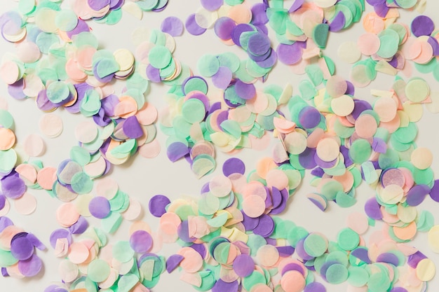 Bright confetti scattered on table
