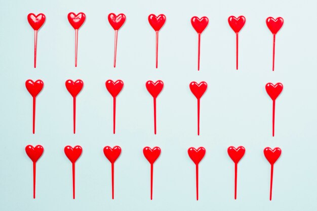 Free photo bright heart sticks composition