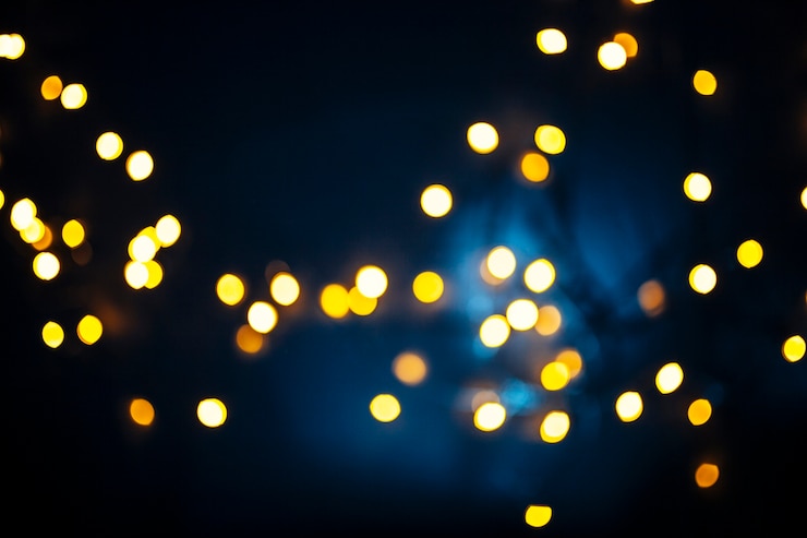 Free Photo bright lights on dark blue background