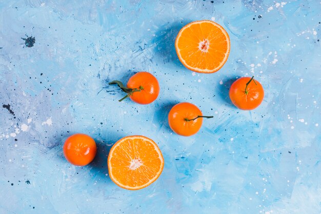 Bright orange fruit on blue