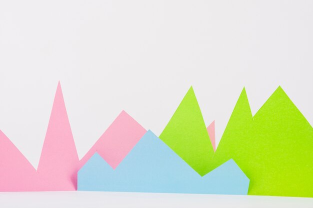 Free photo bright paper mountains on white background