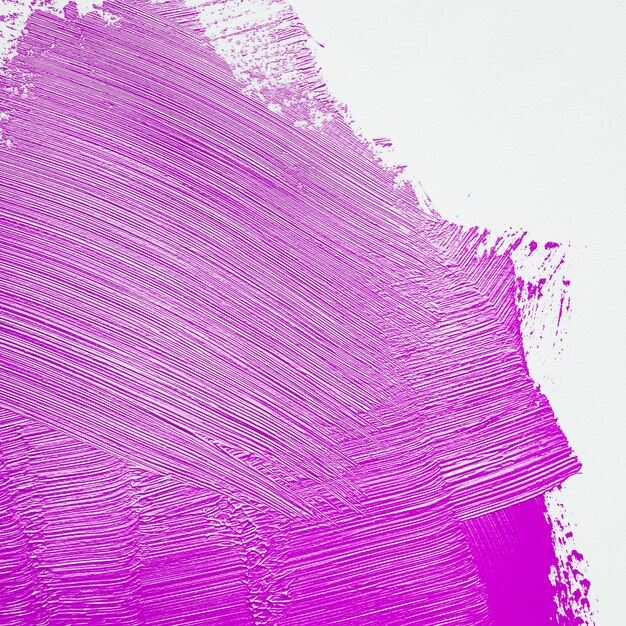 Bright purple brushstroke on wall