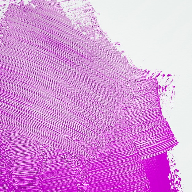 Bright purple brushstroke on wall