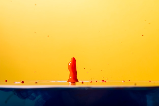 Bright red splash in water