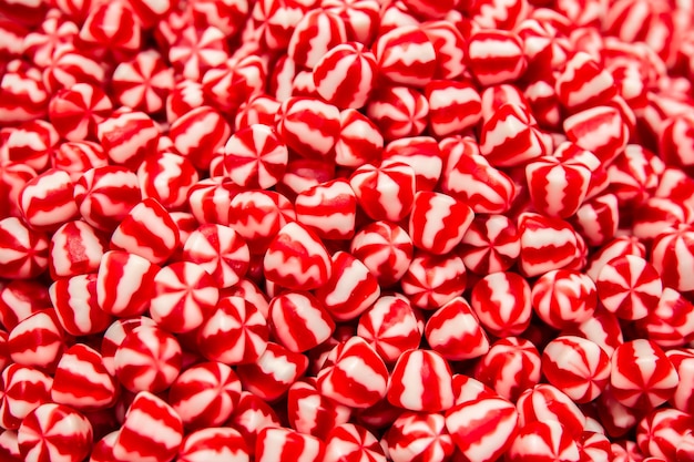 Bright red and white gummies top view