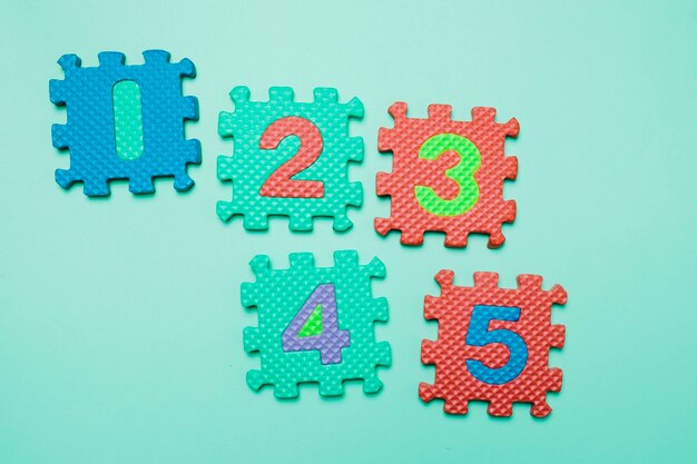 bright rubber puzzles on blue