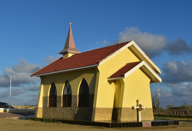 Bright sun shining on Alto Vista Chapel in Aruba.
