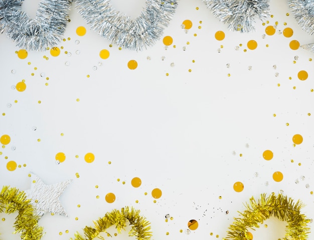 Bright tinsel with spangles on table