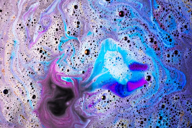 Brightly blue and pink bath bomb surface backdrop