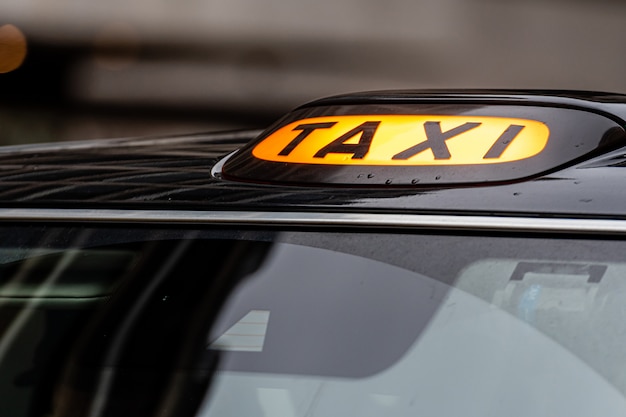 Download Free A British London Black Taxi Cab Sign Premium Photo Use our free logo maker to create a logo and build your brand. Put your logo on business cards, promotional products, or your website for brand visibility.