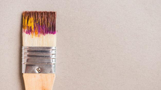 Broad brush with paint