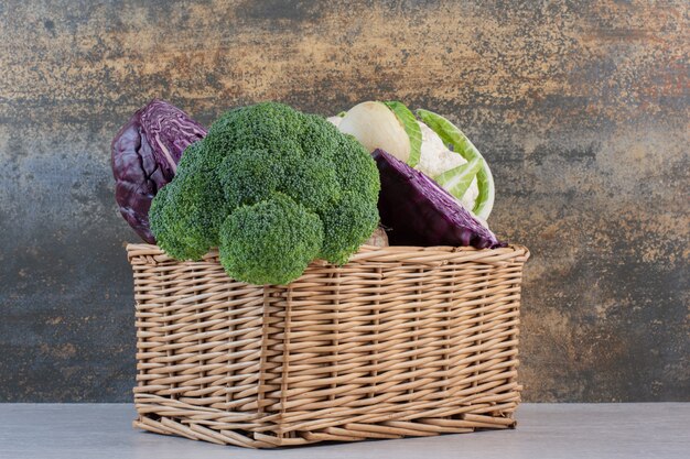 Broccoli, cabbage and radish in wooden box. High quality photo