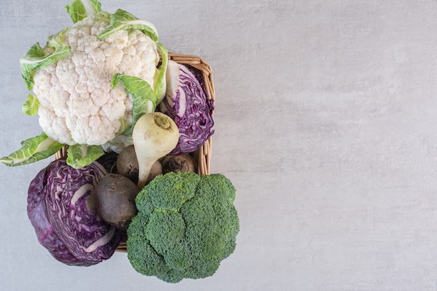 Broccoli, cabbage and radish in wooden box. High quality photo