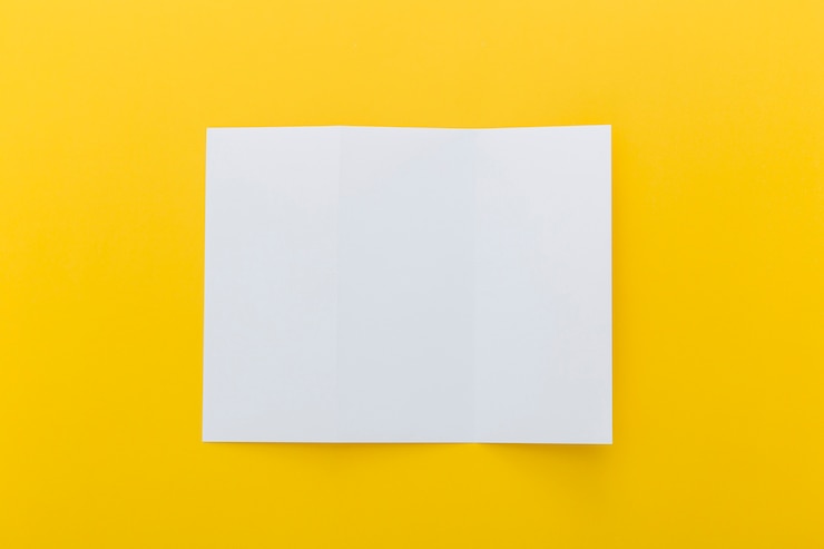 Free Photo brochure on yellow background