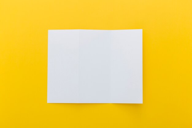 Brochure on yellow background