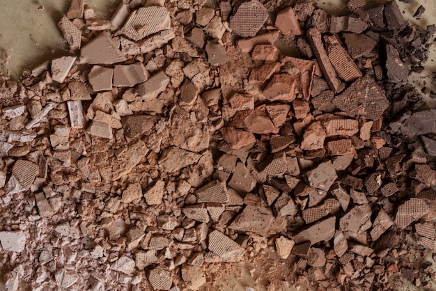 Broken brown eyeshadow powder background