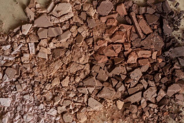 Broken brown eyeshadow powder background