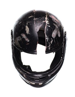 Сломанный мотоциклетный шлем, изолированные на белом фоне