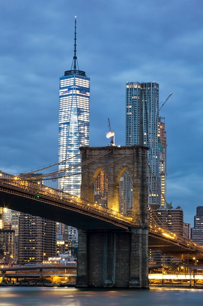 Brooklyn Bridge at dusk viewed from the Brooklyn Bridge Park in New York City