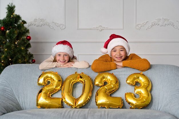 Brother and sister celebrating new years eve at home together