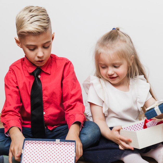 Brother and sister with christmas present