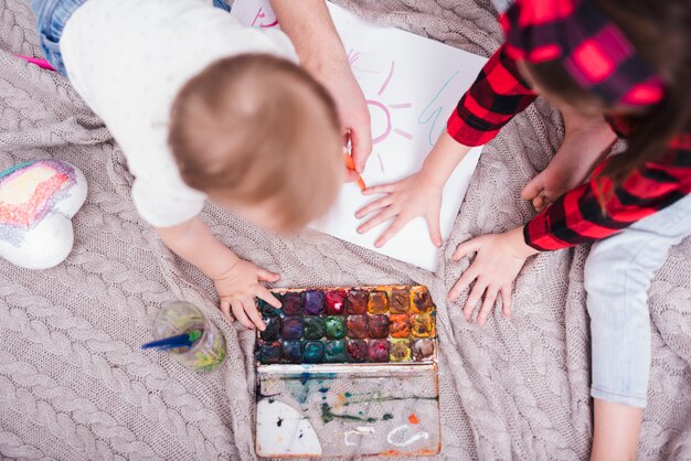 Brothers painting together