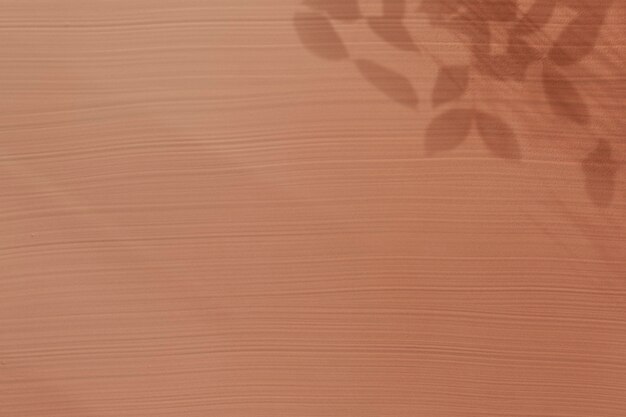 Brown acrylic texture background with leaf shadow
