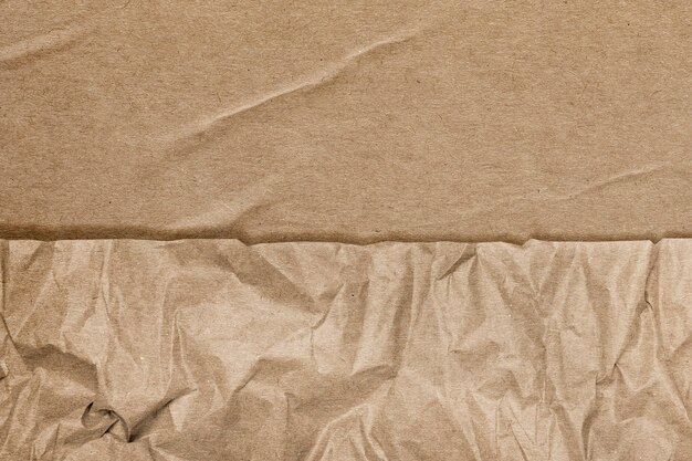 Brown background with wrinkled paper texture remixed media