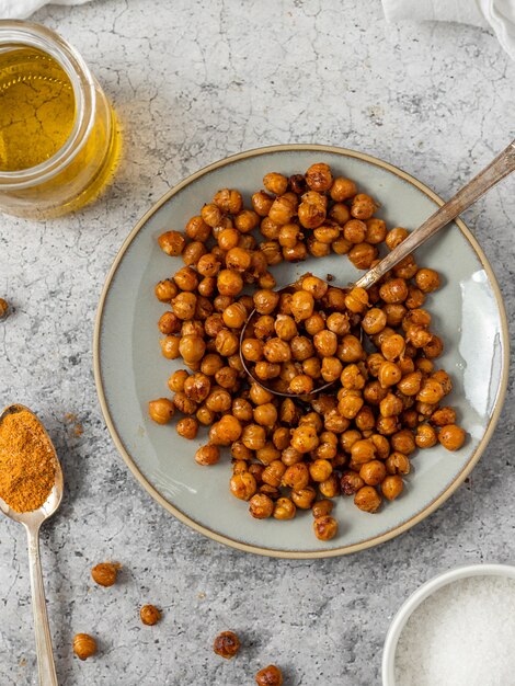 Brown beans on white ceramic plate