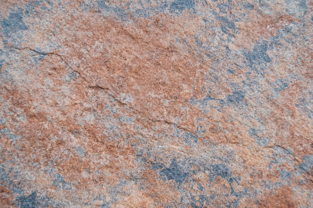 茶色と青の石の壁の背景