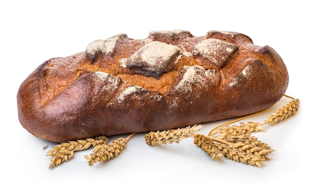 Brown bread and wheat isolated on a white background