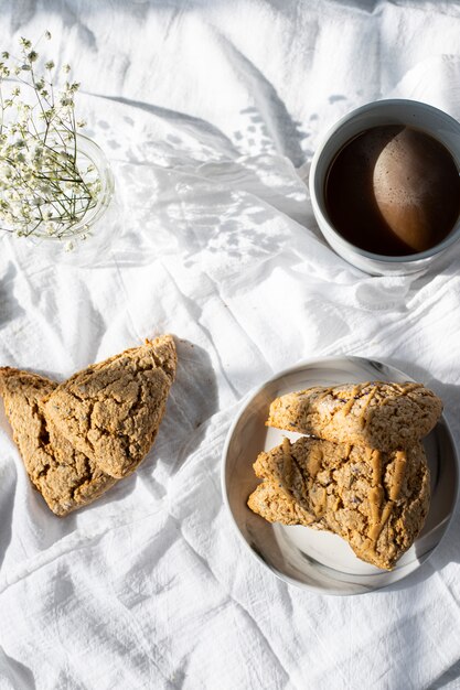 Brown bread on white textile