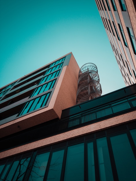 Brown building and exterior metallic staircase