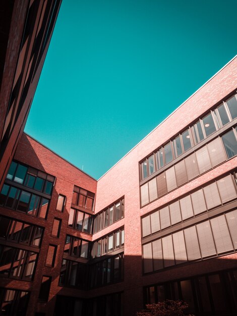 Brown concrete building and clear blue sky