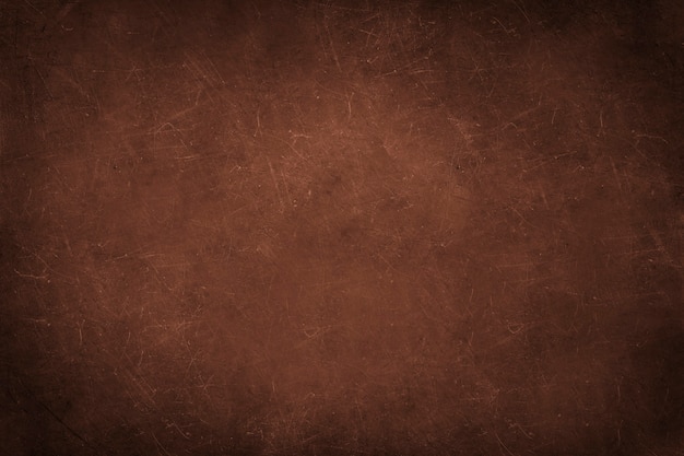 Free Photo brown concrete wall with scratches vector
